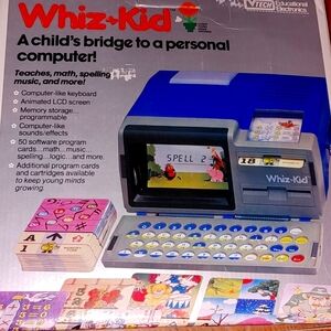 '80s computer with cards cartridges and instructions wiz kids